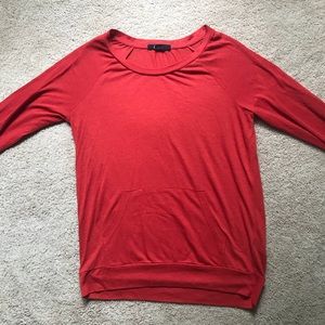 Orange long sleeve T-shirt with front pocket